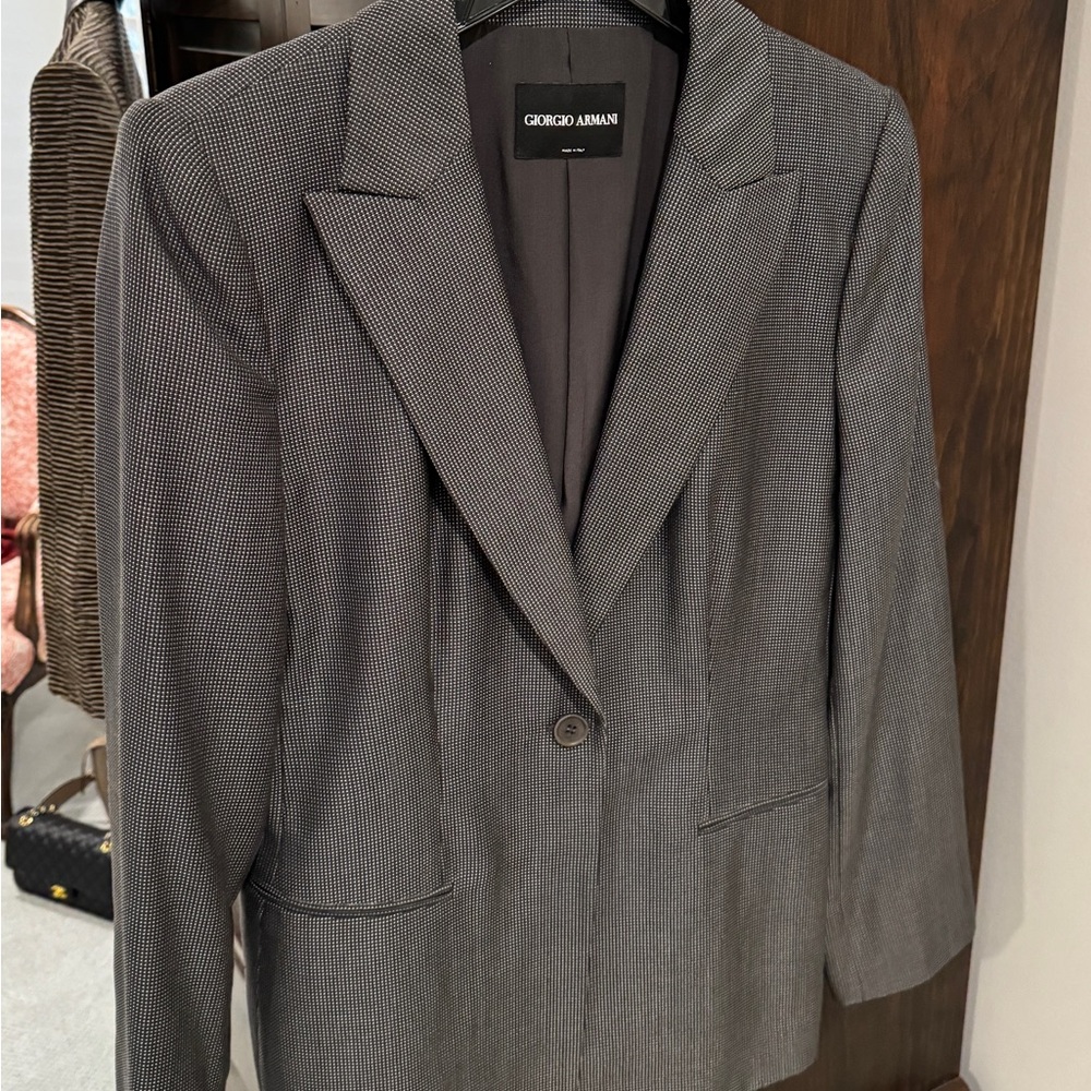 Giorgio Armani jacket in black and a khaki pindot. Silk and Wool. Size 12/48.